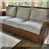 F18. Lexington Furniture Nick wicker sofa with new cushions 33”h x 84”w x 37”d 